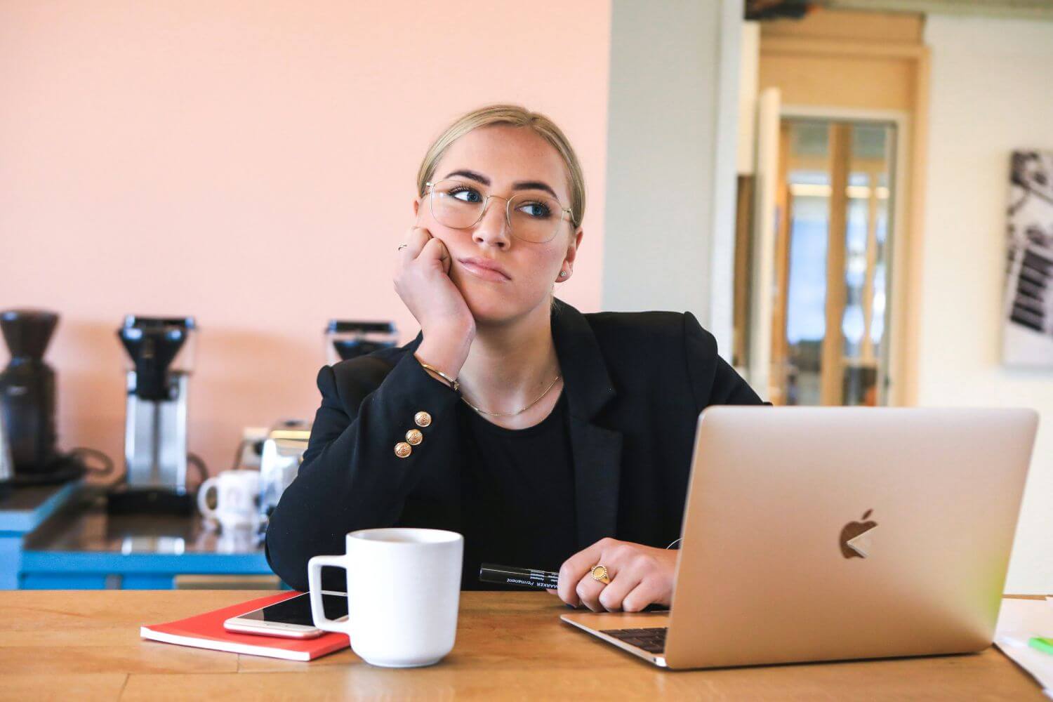 student at desk doing phd procrastination