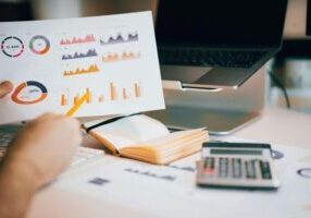 student at desk analysing graphs of hyper-personalised marketing in canada